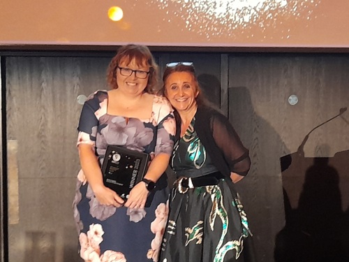 Dionne Suppiah with awards host Lucy Porter